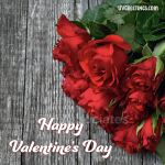 Valentine’s Day eCard with Red Roses bunch lying on wooden plank.